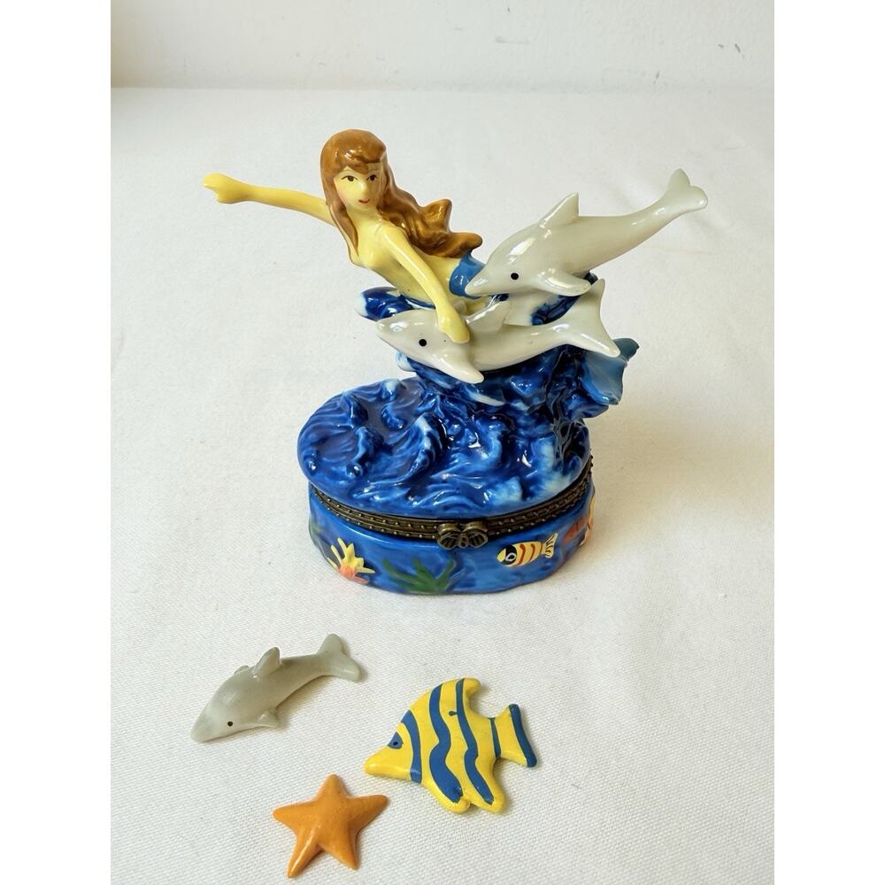 A Sea Mermaid Dolphin Hinged Trinket Box With Trinkets